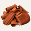 A pile of reddish-brown wood shavings and small cut wood pieces arranged on a plain light background.