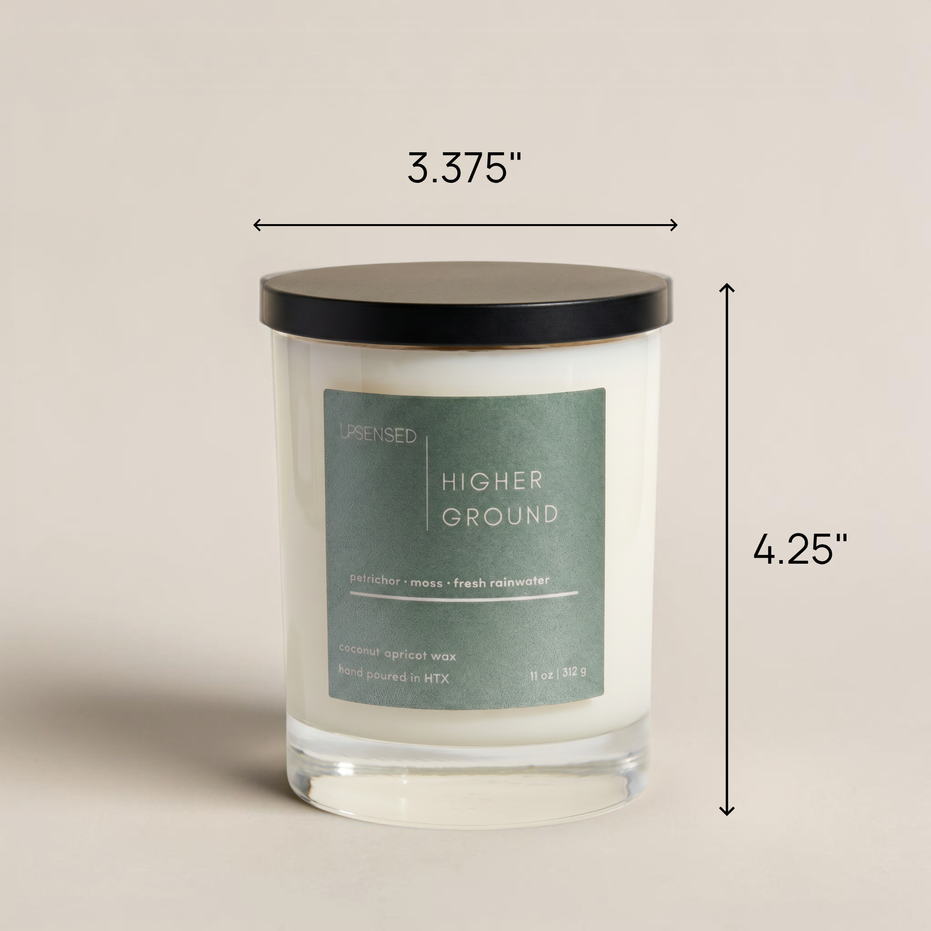 Upsensed Higher Ground scented candle dimensions - 3.375 inches wide by 4.25 inches tall - 11oz coconut apricot wax candle with petrichor moss and fresh rainwater fragrance hand poured in Houston