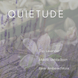 Quietude candle scent notes with lavender, vanilla bean, and ambered musk over a soft floral lavender background.