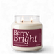 Upsensed Berry Bright 18 oz double-wick soy candle, lit, in a clear apothecary jar with a deep berry label listing sugar plum, white musk, and mulled citrus