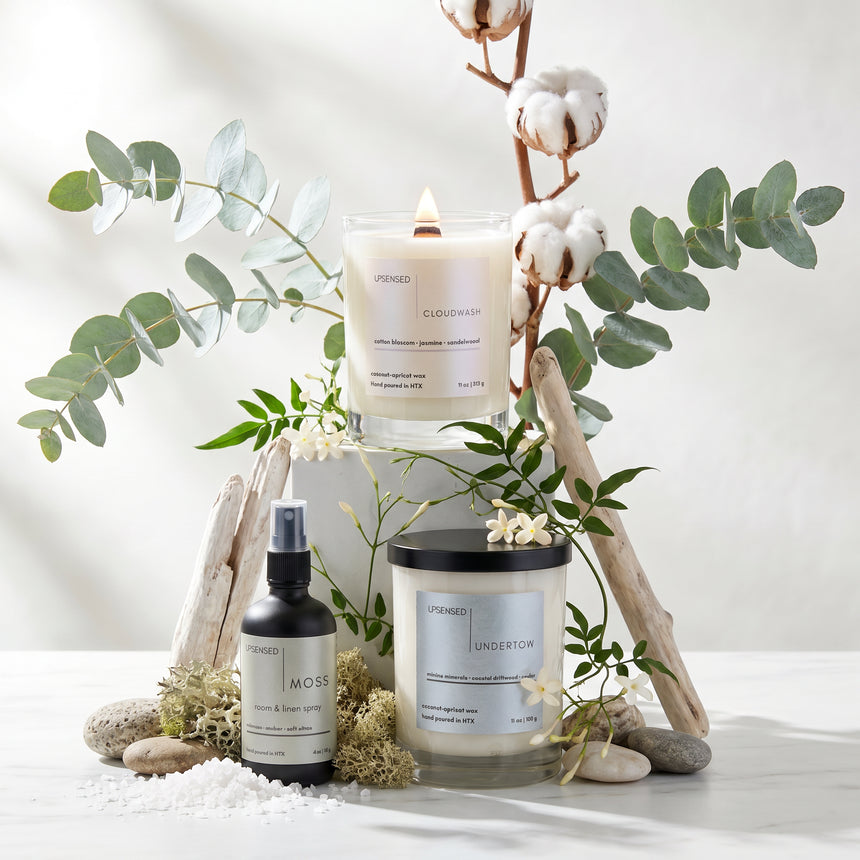 Upsensed clean and fresh candles Cloudwash and Undertow with Moss room spray styled with cotton stems, eucalyptus, coastal driftwood, sea salt, and jasmine