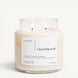 Upsensed Cloudwash 16 oz double-wick candle in a clear apothecary jar with a white label, cotton blossom, jasmine, and sandalwood scent notes, on a plain white background.