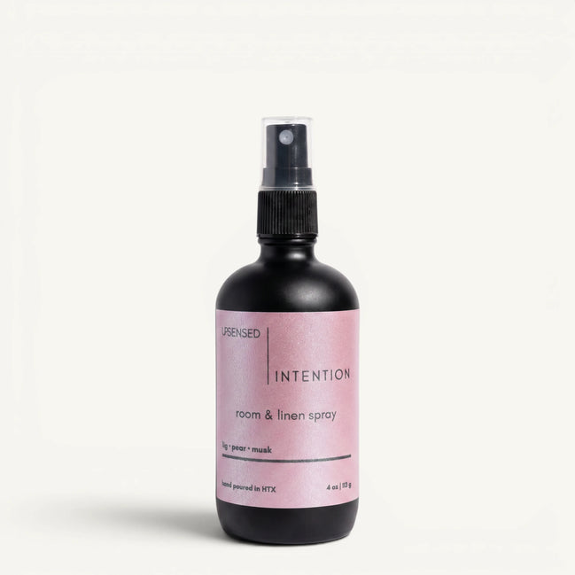 Upsensed Intention 4oz Room and Linen Spray in matte black bottle with blush pink label - fig pear and musk linen spray