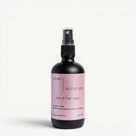 Upsensed Intention 4oz Room and Linen Spray in matte black bottle with blush pink label - fig pear and musk linen spray
