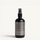 Upsensed Lignum 4oz Room and Linen Spray in matte black bottle with charcoal label - palo santo citrus zest and cedarwood linen spray