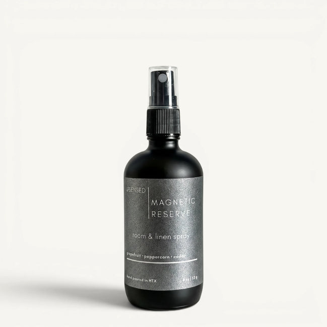 Upsensed Magnetic Reserve 4oz Room and Linen Spray in matte black bottle with charcoal label - grapefruit peppercorn and cedar linen spray hand poured in Houston