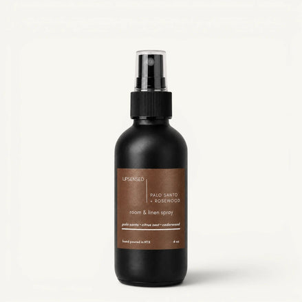 Upsensed Palo Santo + Rosewood room and linen spray, 4 oz black bottle with palo santo, citrus zest and cedarwood scent notes