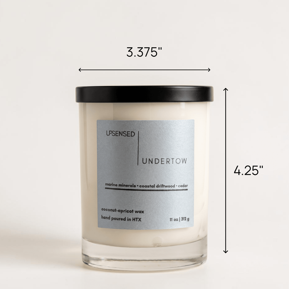 Upsensed Undertow candle with black lid showing dimensions — 3.375 inches wide by 4.25 inches tall